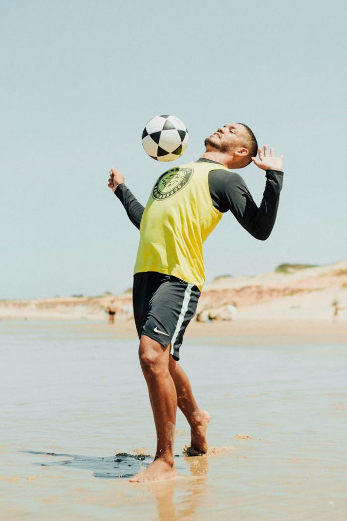 pexels-photo-12907132 A Man Hitting a Ball with his Chest